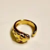 Anillo ajustable de acero dorado puma