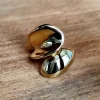 Anillo dorado de acero