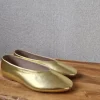 Bailarinas de mujer doradas