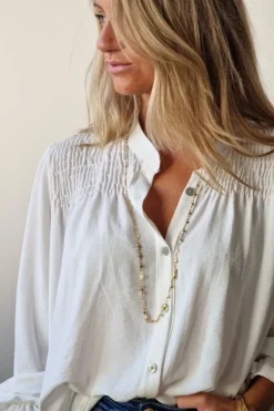 Blusa con botones blanco roto