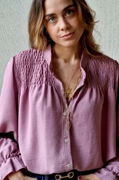Blusa con botones rosa