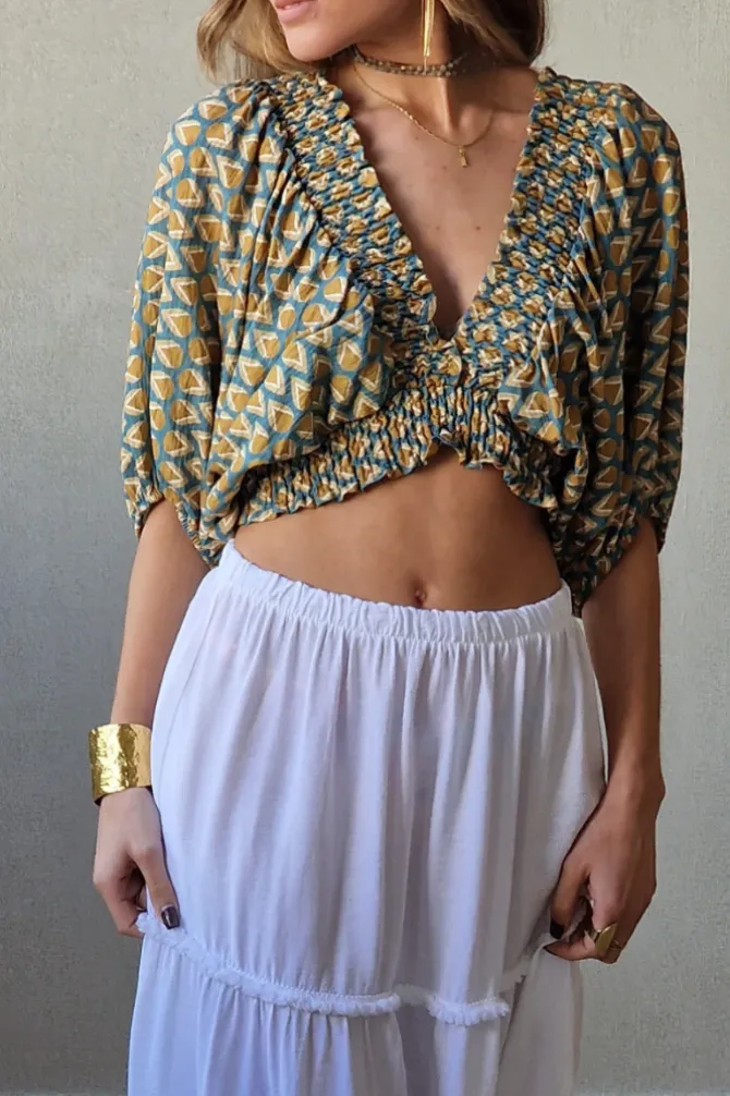 blusa corta goma azul y mostaza