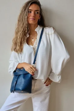 Blusa crepe blanco roto volantes