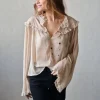 Blusa crudo tipo gasa con volante