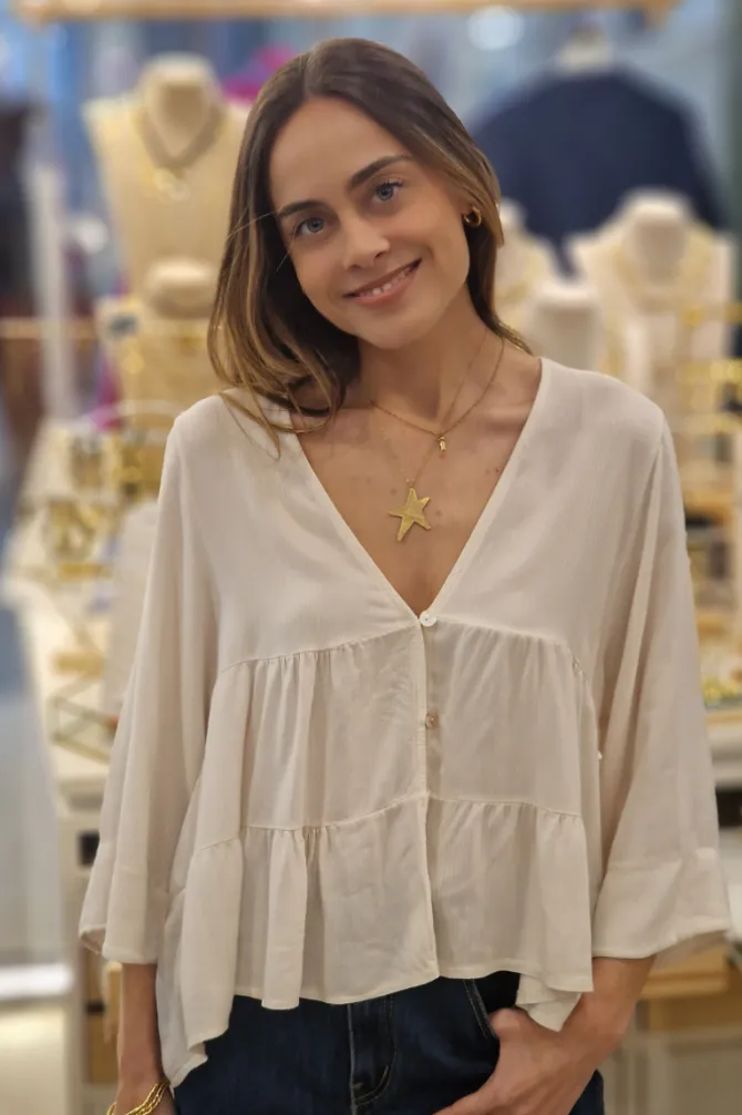 Blusa cuello pico con cortes beige