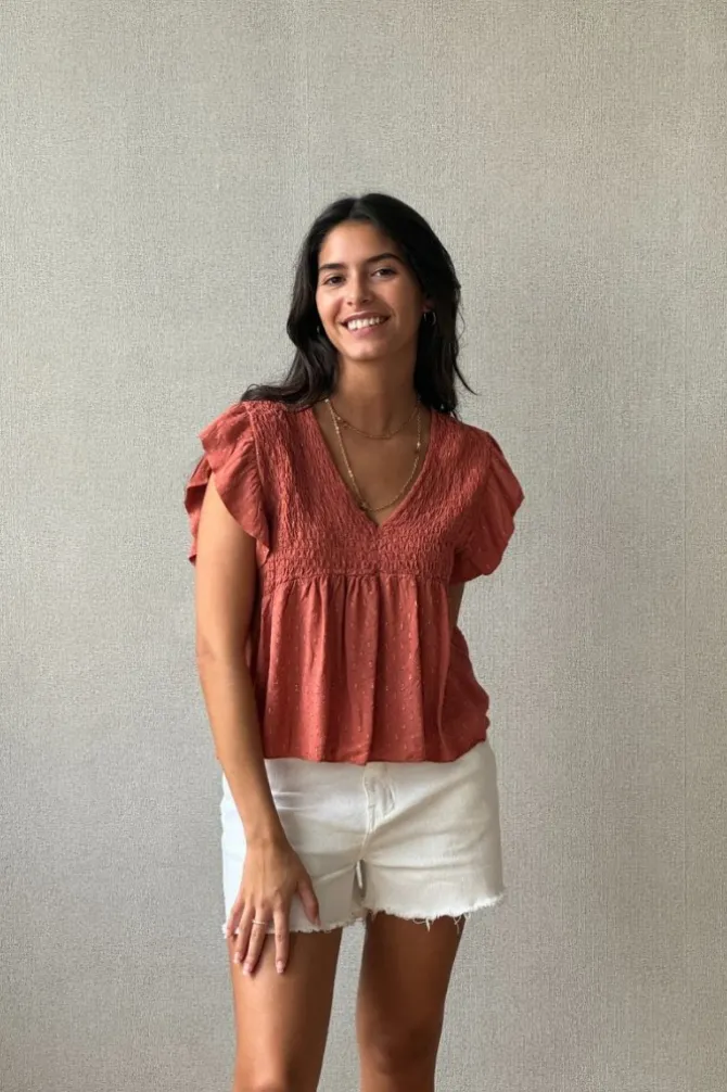 Blusa cuello pico con detalles lurex caldero