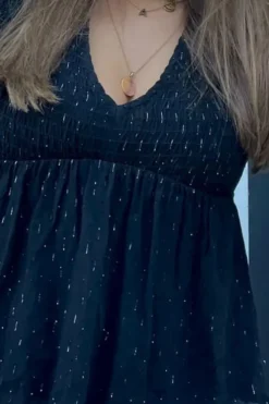 Blusa cuello pico con detalles lurex negro