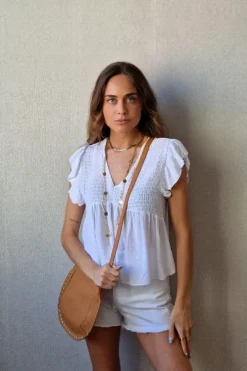 Blusa cuello pico con detalles lurex blanca