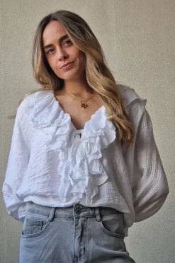 Blusa cuello pico con volantes blanco