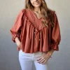 Blusa cuello pico con vuelo caldero