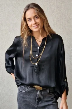 Blusa de mujer raso gordo negra