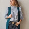 Blusa de rayas con escote fruncido y volate en la manga negro