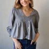 Blusa fruncida con hilo plateado gris