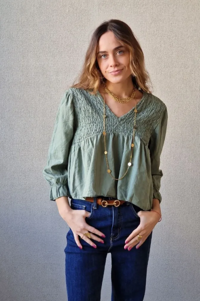 Blusa fruncida con hilo plateado verde militar