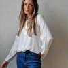 Blusa plumeti y lurex blanca