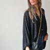 Blusa plumeti y lurex negra
