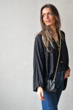 Blusa plumeti y lurex negra