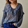 Blusa tipo gasa de flores azul