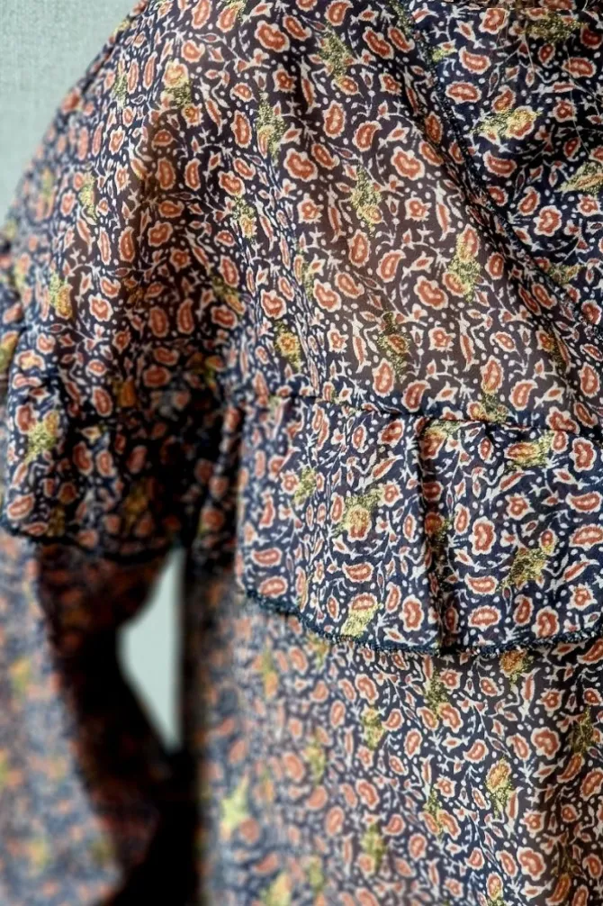 Blusa tipo gasa de flores azul