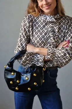 Bolso baguette negro con tachas