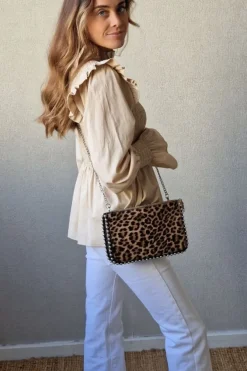 Bolso bandolera tachas animal print beige