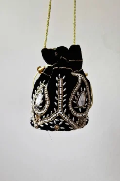 Bolso bombonera negro y dorada