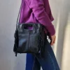Bolso de piel con flecos negro