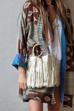 Bolso de piel liso con flecos dorado