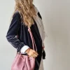 Bolso de piel tipo bombonera rosa
