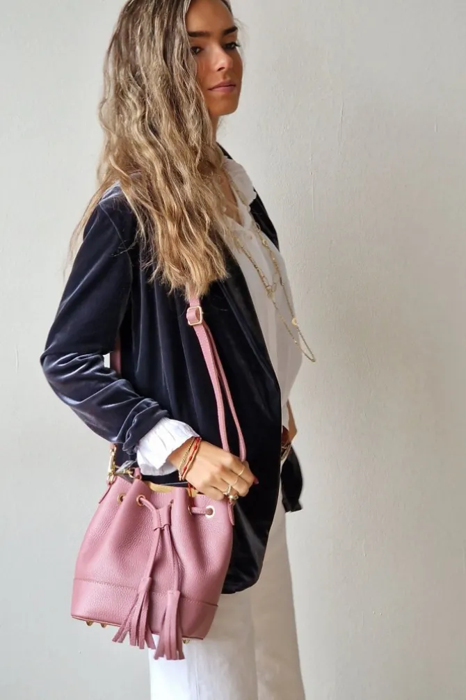 Bolso de piel tipo bombonera rosa