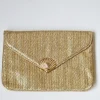 Bolso fiesta tipo rafia dorado y concha
