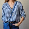 Bolso mini de ante y flecos azul