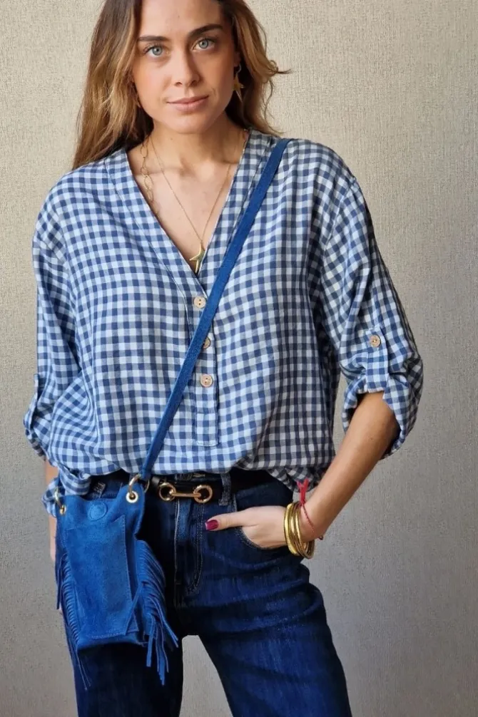 Bolso mini de ante y flecos azul