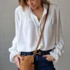 Bolso mini de ante y flecos camel