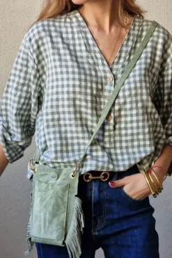 Bolso mini de ante y flecos verde