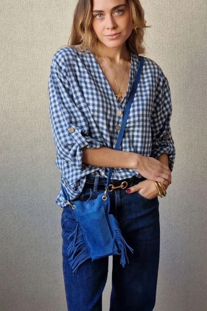 Bolso mini de ante y flecos azul