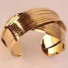 Brazalete acero cruzado Dorado