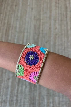 Brazalete ajustable naranja flores