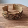Brazalete de acero animal print