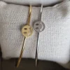 Brazalete de acero rígido fino carita feliz