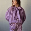Camisa con lazo lila