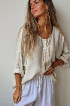 Camisa oversize tipo lino con manga tres cuartos beige