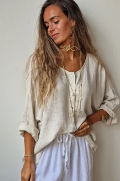 Camisa oversize tipo lino con manga tres cuartos beige