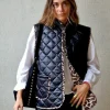 Chaleco acolchado con detalles animal print negro