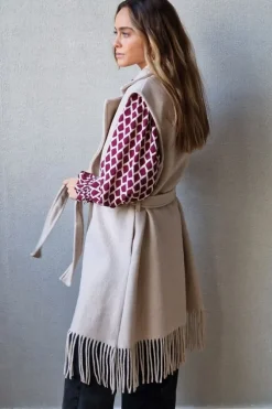 Chaleco beige con flecos