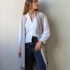 Chaleco oversize topo de punto con flecos y bolsillos