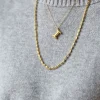 Collar acero dorado