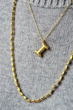 Collar acero dorado