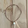 Collar ajustable concha rosa