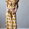 Conjunto falda y top mostaza